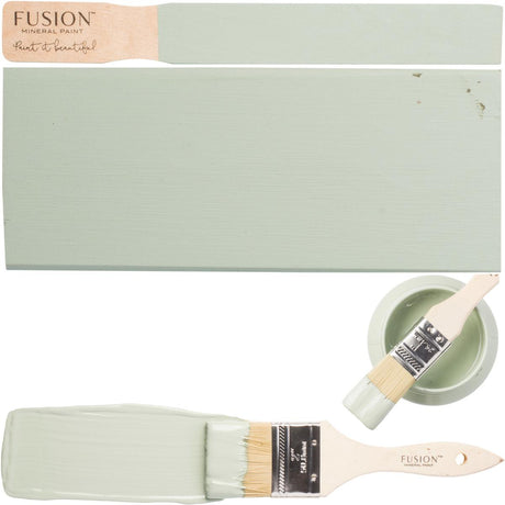 Brook Fusion Mineral Paint, paintbrush, and sage green painted wood sample.