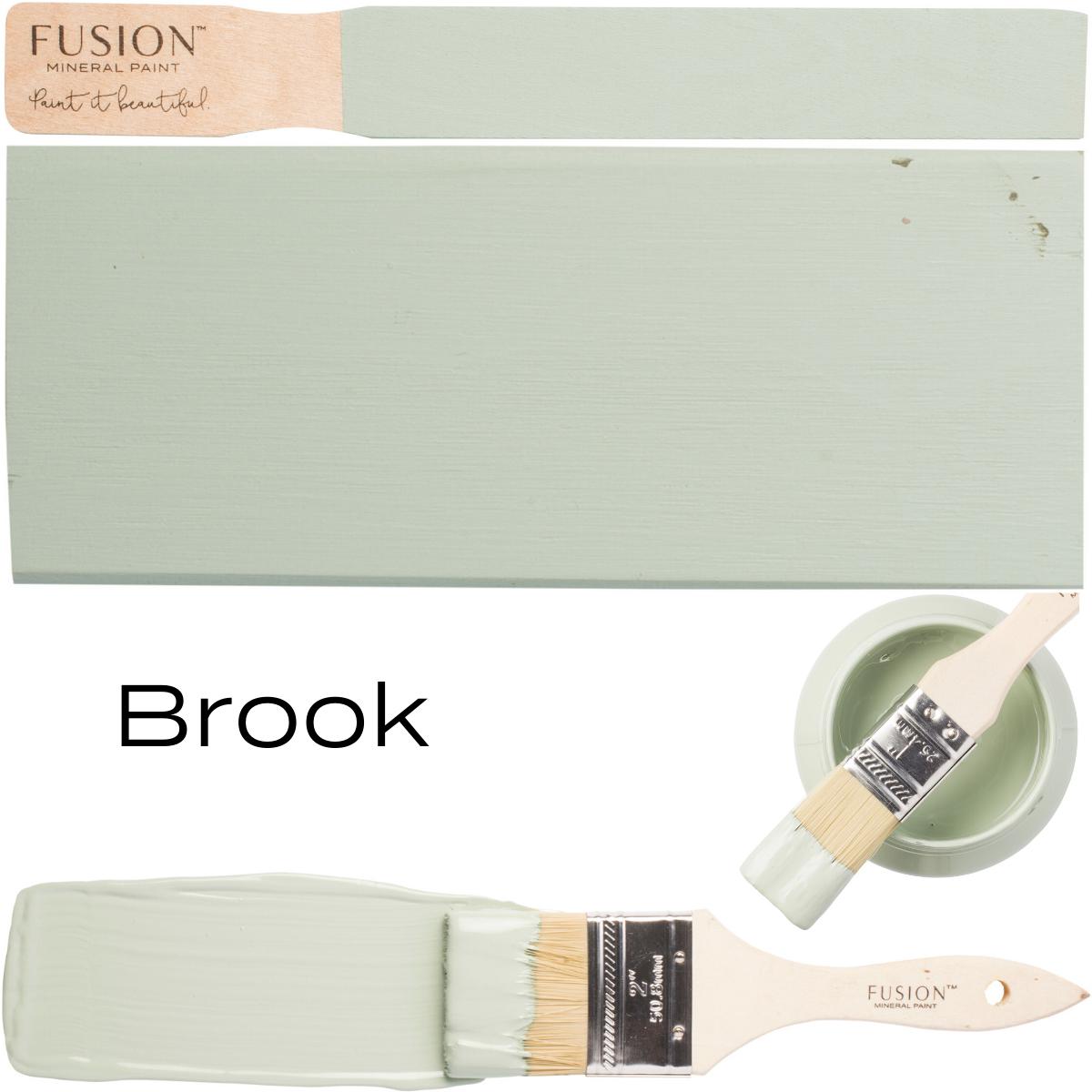 Brook Fusion Mineral Paint light green swatch with brush dipped in matching paint.