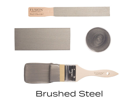 Brushed Steel Metallic Fusion Mineral Paint by Fusion on stirrer, brush, swatch, and container against white background.