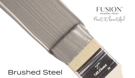 Paintbrush with Brushed Steel Metallic Fusion Mineral Paint beside text reading “Paint it beautiful.”.