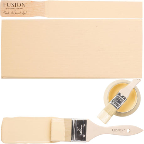 Wood painted creamy yellow with Fusion Mineral Paint Buttermilk Cream and a brush next to the open paint jar.