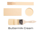 Four Buttermilk Cream Fusion Mineral Paint samples shown on brushes, paint swatches, and in a cup.