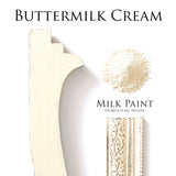 Buttermilk Cream Milk Paint sample by Homestead House on painted wood trim with decorative designs.