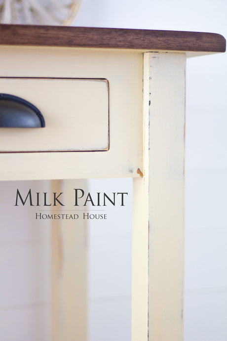 Cream wooden table finished with Buttermilk Cream Milk Paint by Homestead House.