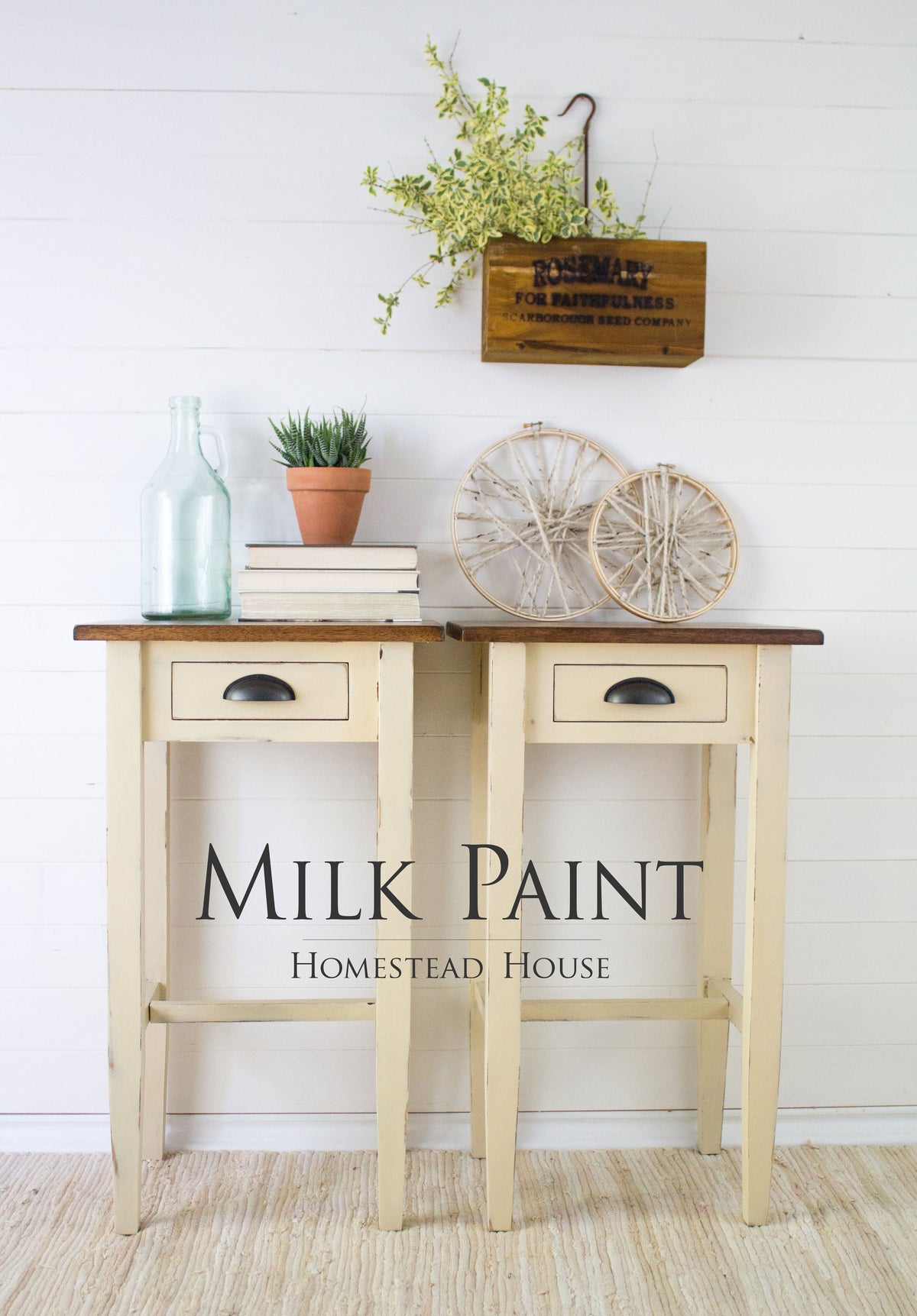 Pair of side tables painted Buttermilk Cream by Homestead House, shown with books and plants for scale.
