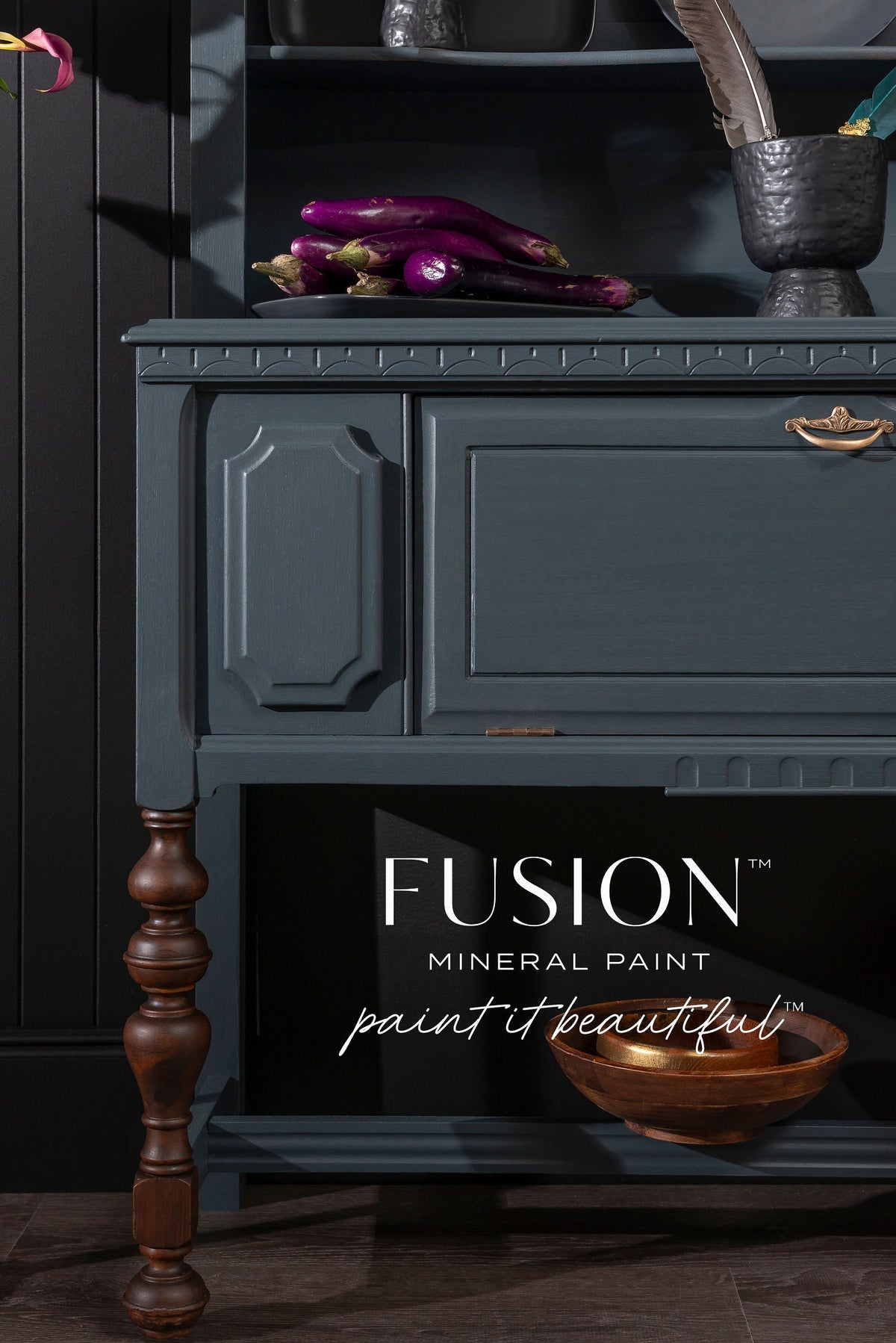 Teal cabinet with wooden legs, eggplants, and Fusion Mineral Paint Cambridge in dark blue.