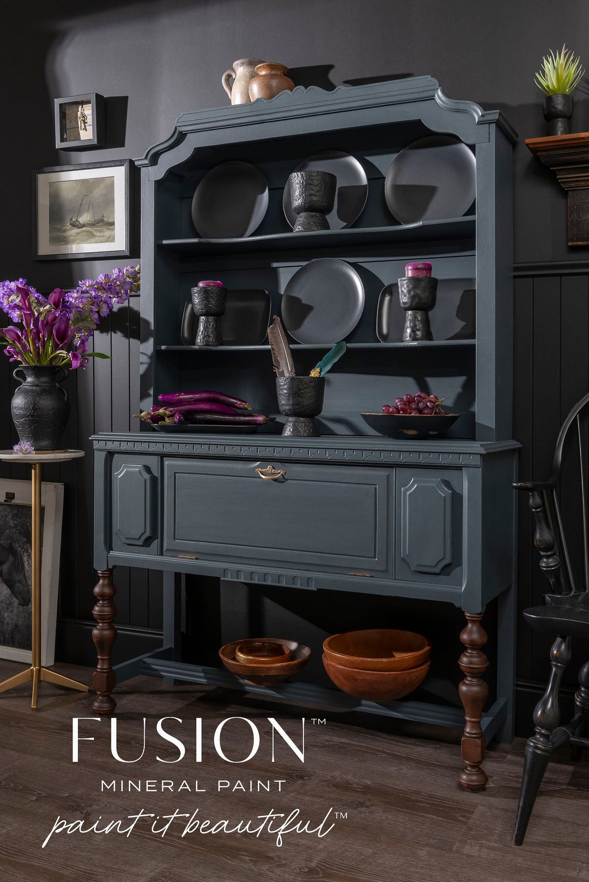 Cambridge Fusion Mineral Paint hutch displaying dishes, goblets, fruit, and flowers.