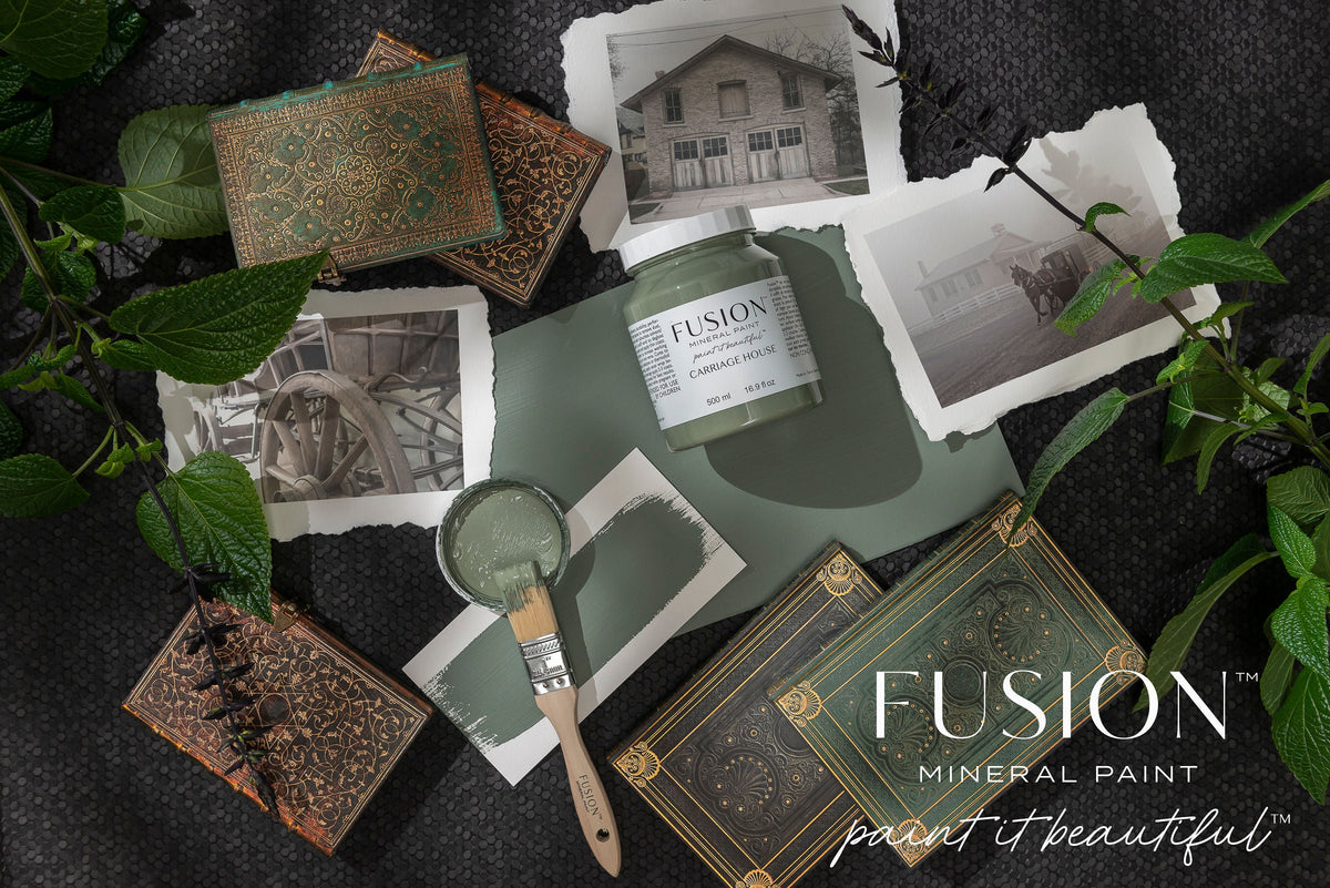 Carriage House Fusion Mineral Paint jar with brush, leaves, vintage photos, and books displaying Fusion branding.