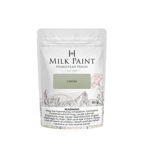 50g Homestead House Cartier Milk Paint bag with warning label and farmhouse illustration on packaging.