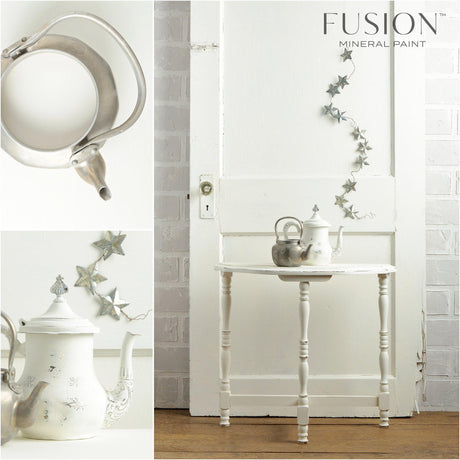 White teapot and table in front of Casement Fusion Mineral Paint wall, accented with metal stars and wall text.