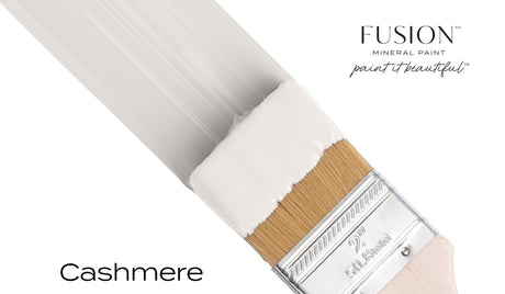 Brush with Fusion Mineral Paint Cashmere color against a white backdrop.