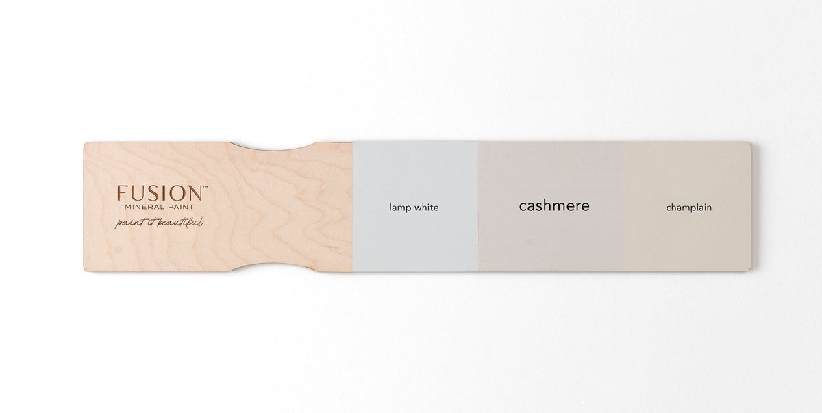 Fusion Mineral Paint swatch paddle with Lamp White, Cashmere, and Champlain matte finish color samples.