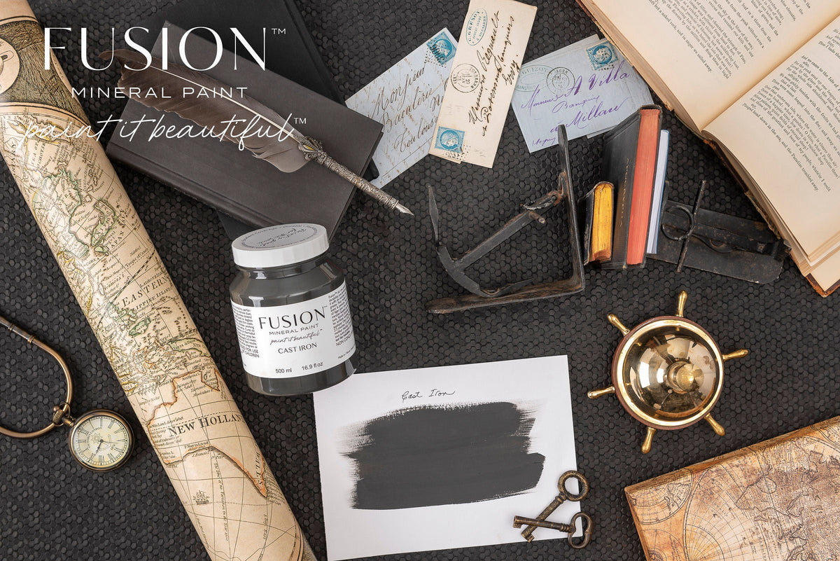 Fusion Mineral Paint Cast Iron swatch with compass, anchor, vintage letters, and DIY paint accents arranged flat.