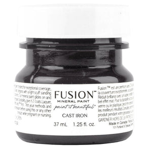 37 mL jar of Fusion Mineral Paint in Cast Iron, black lid, white label, by Fusion Mineral Paint.