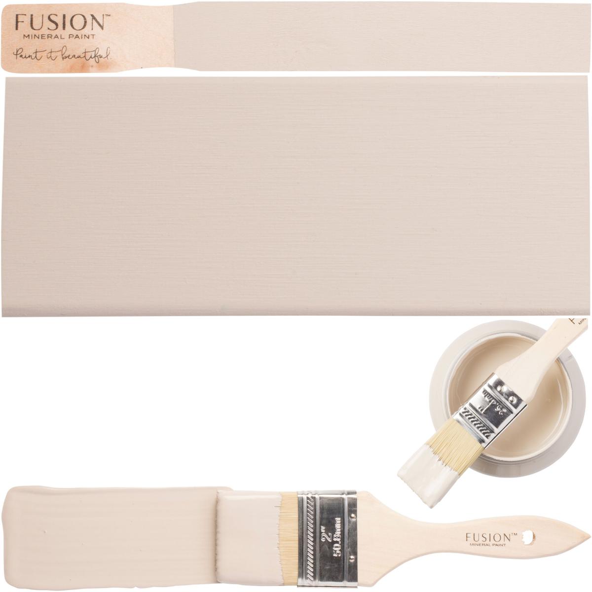 Brush with Cathedral Taupe Fusion Mineral Paint showing smooth and distressed beige acrylic finish.