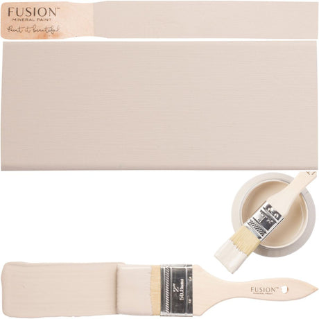 Brush with Cathedral Taupe Fusion Mineral Paint showing smooth and distressed beige acrylic finish.