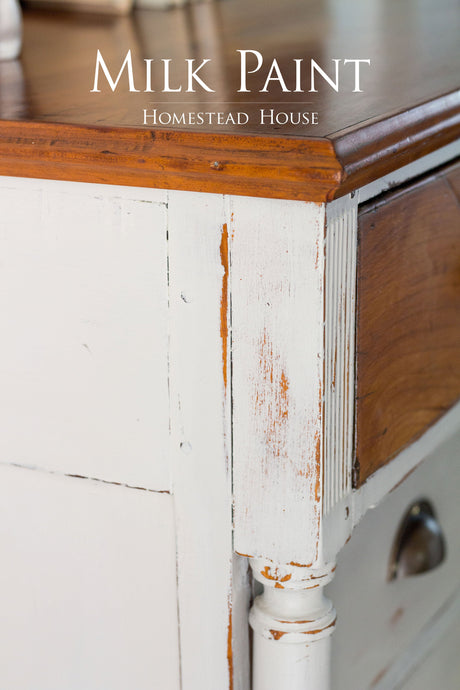 White dresser with wood top and Homestead House Cathedral Taupe Milk Paint overlay text.