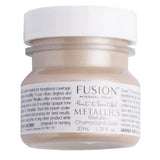 Fusion Mineral Paint Champagne Gold Metallic jar with shimmery label and visible fine mica pigments.