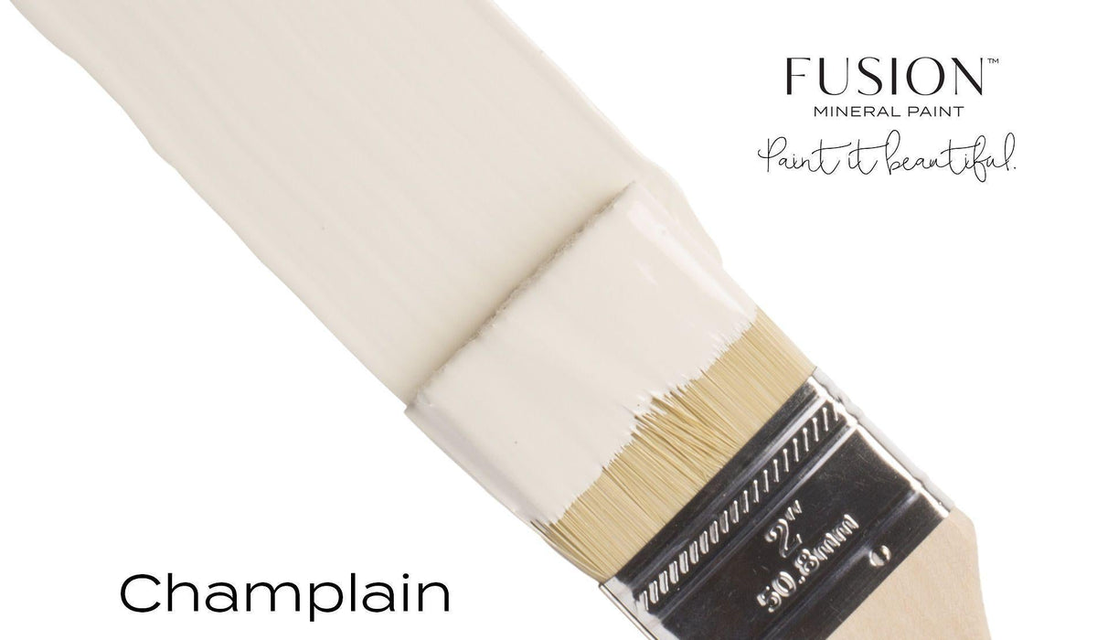 Brush with Champlain Fusion Mineral Paint by Fusion Mineral Paint against a white background.