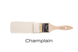 Champlain Fusion Mineral Paint in warm white shown with a paintbrush.
