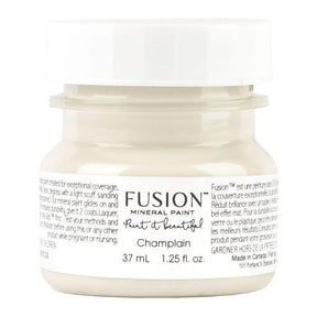 37 mL jar of Fusion Mineral Paint in Champlain, warm white acrylic, with label and white screw-top lid.