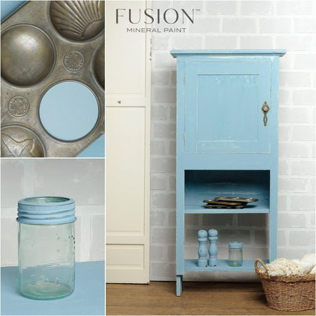Cabinet in Champness Fusion Mineral Paint with vintage baking tin, blue Mason jar, salt and pepper shakers, basket.