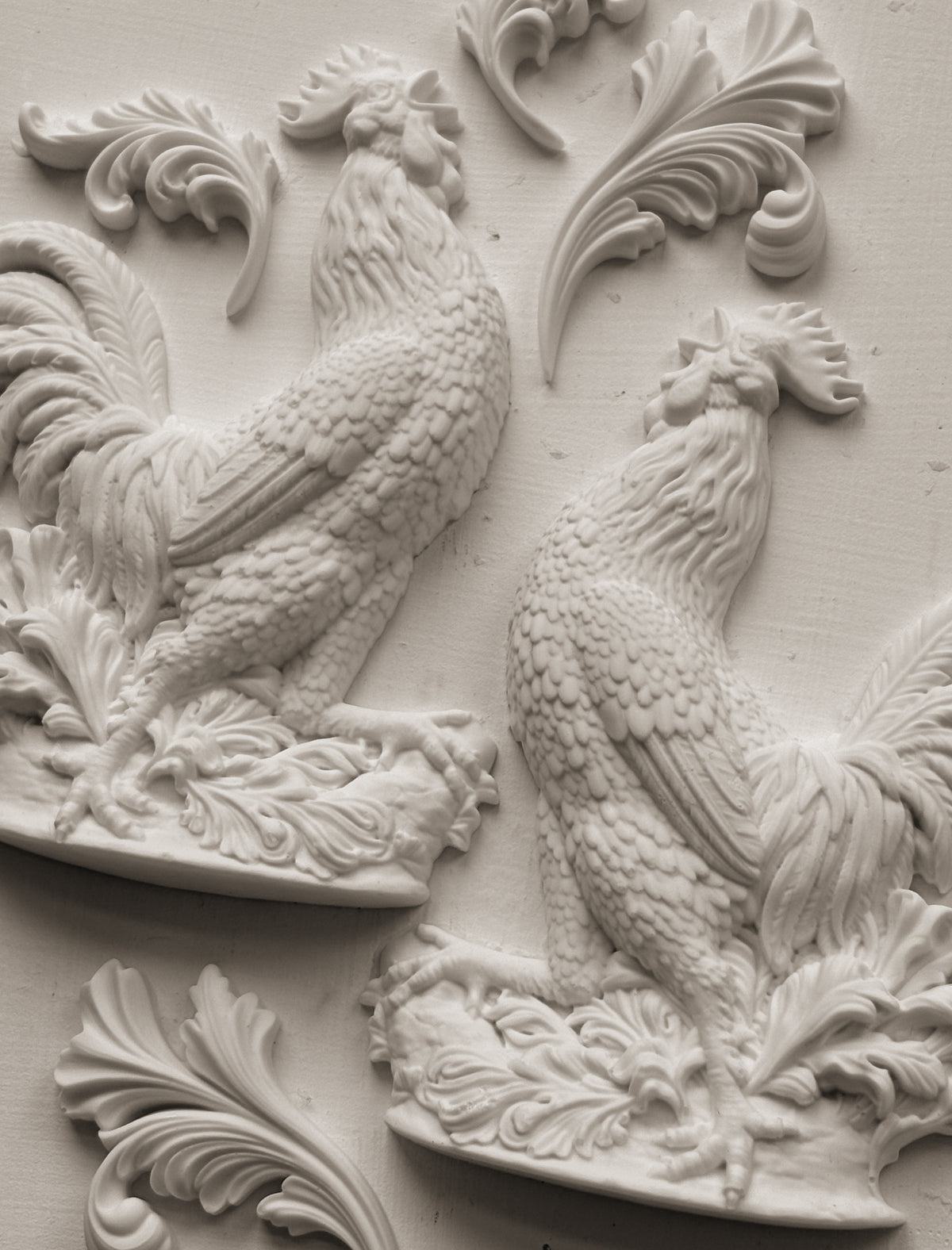 Two rooster reliefs for I.O.D. Chanticleer Mould, suitable for French country decor or craft projects.