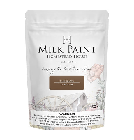 330g Homestead House Chocolate Milk Paint bag featuring a rustic barn illustration on the label.