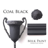 Black urn, powder, and wood sample shown with Homestead House Coal Black Milk Paint finish.
