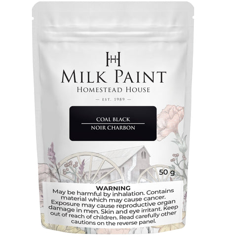Homestead House 50g Coal Black Milk Paint pouch with health warnings and floral-themed packaging.