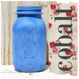 Blue mason jar beside floral “Cobalt – Sweet Pickins Milk Paint” label by Old Fashioned Milk Paint.