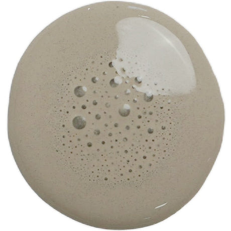 Round pool of Cobblestone – Sweet Pickins Milk Paint with bubbles in center and creamy area at top right edge.