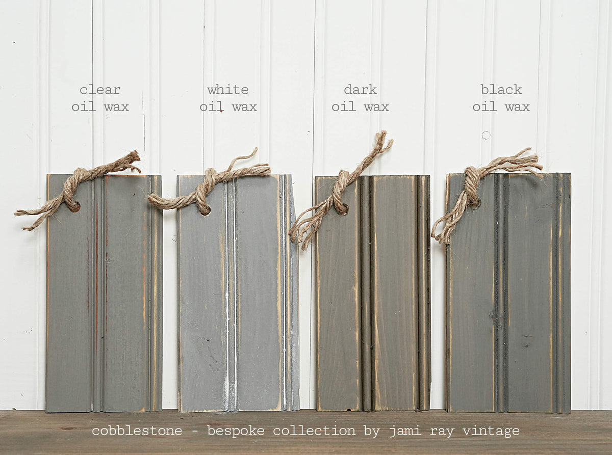 Four oil-waxed wood boards tied with twine, compatible with Old Fashioned Milk Paint Cobblestone–Sweet Pickins.