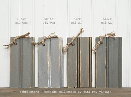 Four oil-waxed wood boards tied with twine, compatible with Old Fashioned Milk Paint Cobblestone–Sweet Pickins.