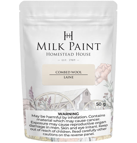 50g pouch of Combed Wool Milk Paint by Homestead House, features floral and wagon illustrations on the label.