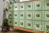 Green apothecary cabinet in Conservatory Fusion Mineral Paint on wood base.