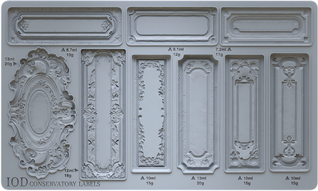 Conservatory Labels Mould by I.O.D., silicone tray with ornate label shapes, includes ml and gram markings.
