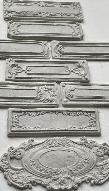Conservatory Labels Mould by IOD with ornate gray silicone plaques for vintage or botanical crafting projects.
