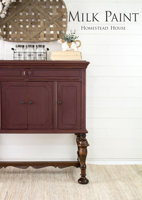 Dark wood sideboard with text overlay: Cranberry Milk Paint by Homestead House.