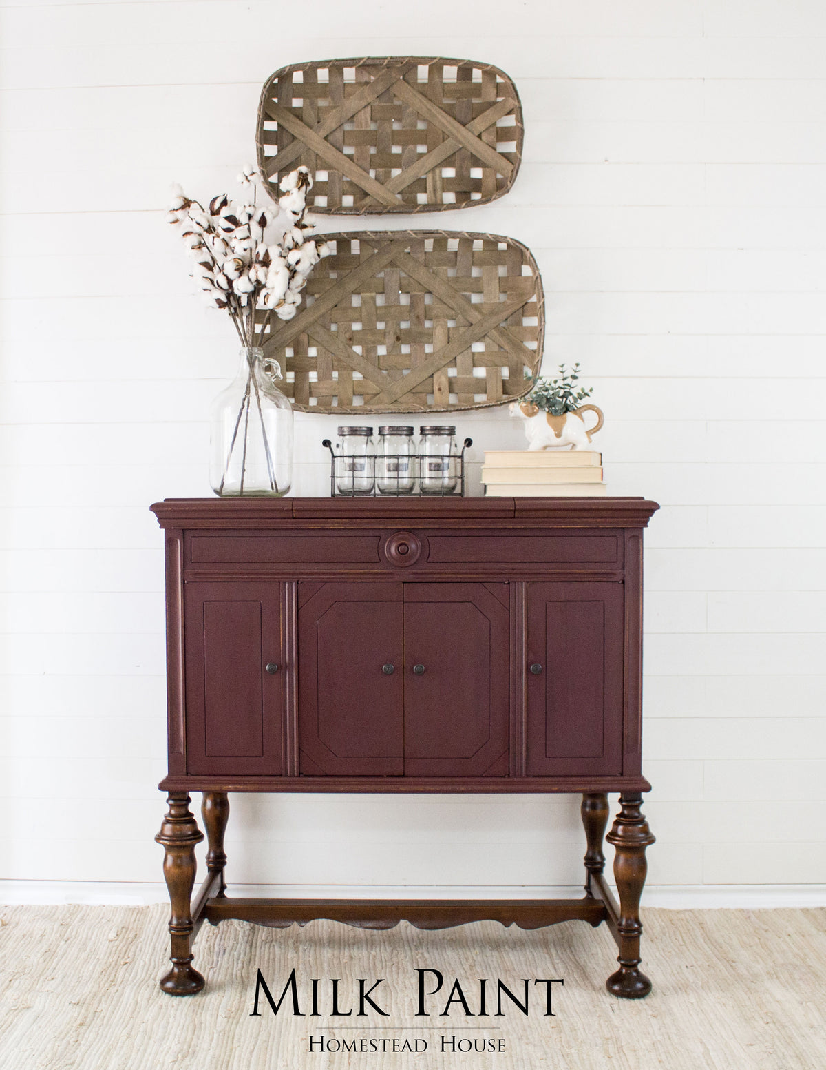 Dark wood sideboard with baskets, finished in Homestead House Cranberry Milk Paint.