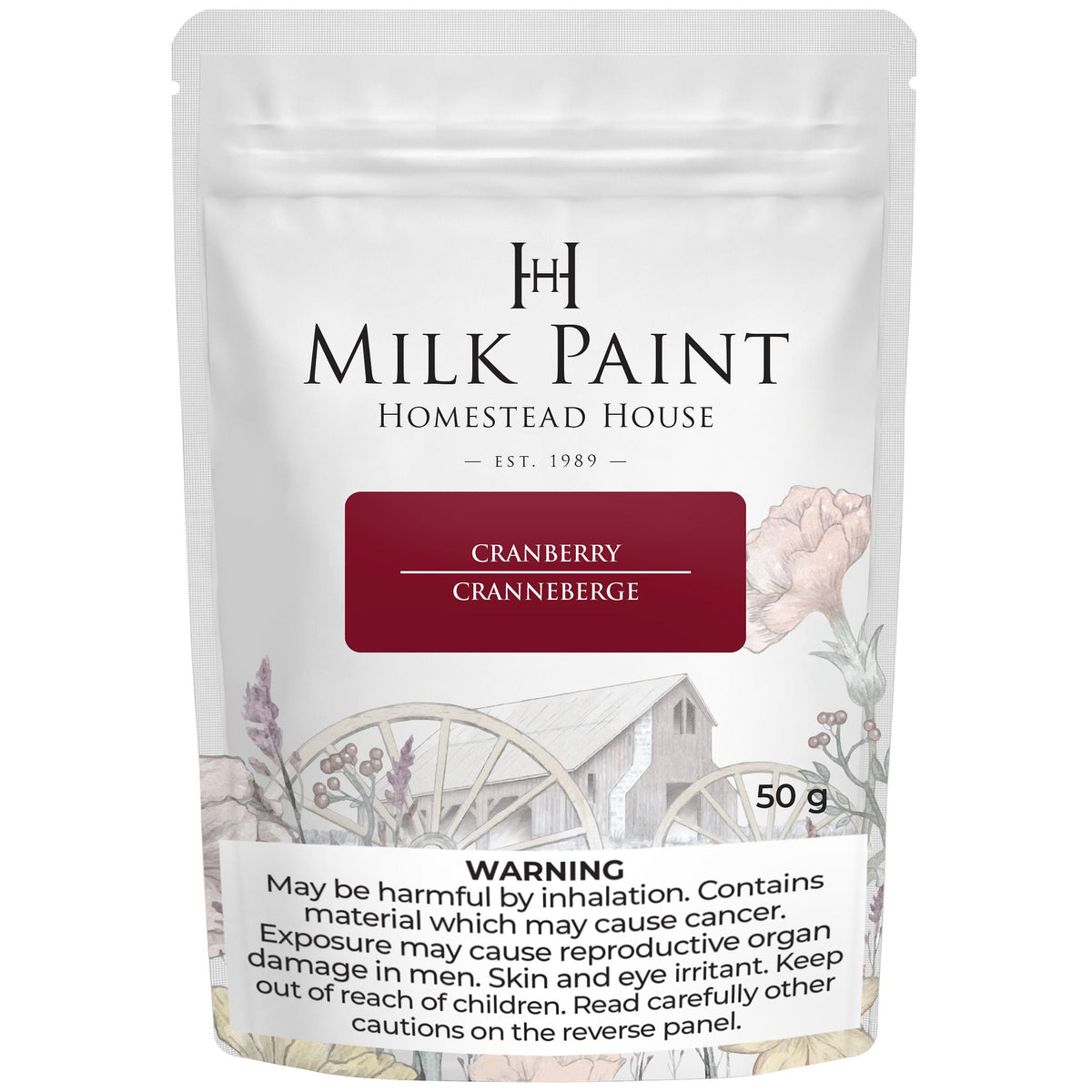Homestead House Cranberry Milk Paint 50g bag with floral art and a visible warning label on the packaging.