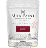 Homestead House Cranberry Milk Paint 330g pouch with wagon wheel and floral label design.