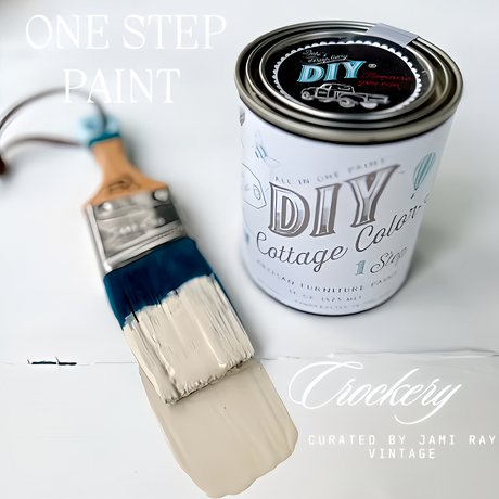 Cream and blue paintbrush next to open DIY Paint Co. Crockery DIY Cottage Color can.