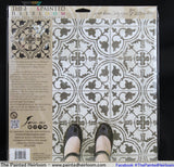 Person wearing black shoes on Cubano Tile Stamp (Retired) by I.O.D. patterned floor.