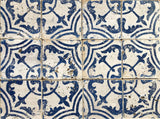 Nine white tiles with blue patterns, aged look, made using I.O.D. Cubano Tile Stamp (Retired) by Iron Orchid Designs.