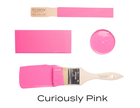 Stick, brush, and lid with CUREiously Pink Fusion Mineral Paint, limited-release shade.