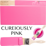 Fusion Mineral Paint CUREiously Pink (Limited Release) can, paintbrush, and painted surface shown together.