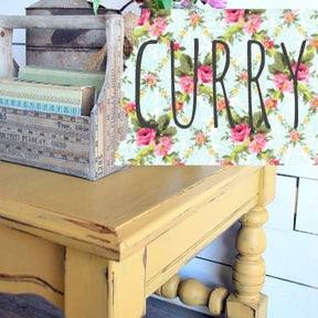 Wooden table with turned legs by floral CURRY sign, painted in Sweet Pickins shade by Old Fashioned Milk Paint.