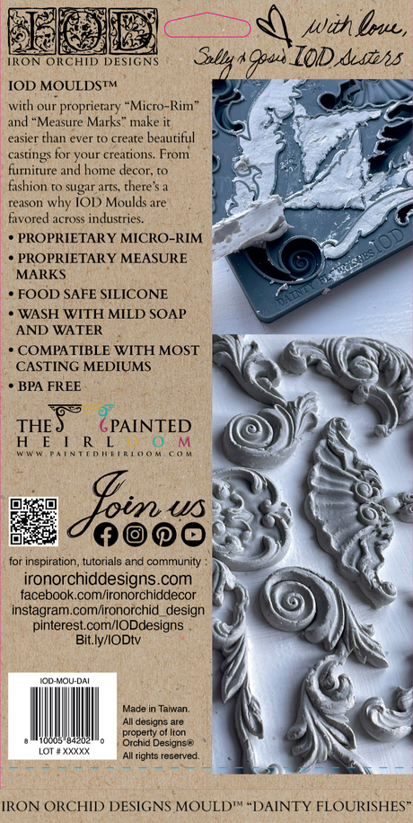 Dainty Flourishes Mould by I.O.D. in soft gray silicone displayed on its branded box showing ornate details.