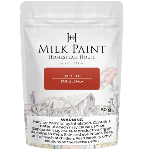 50g pouch of Dala Red Milk Paint by Homestead House with a warning label at the bottom.